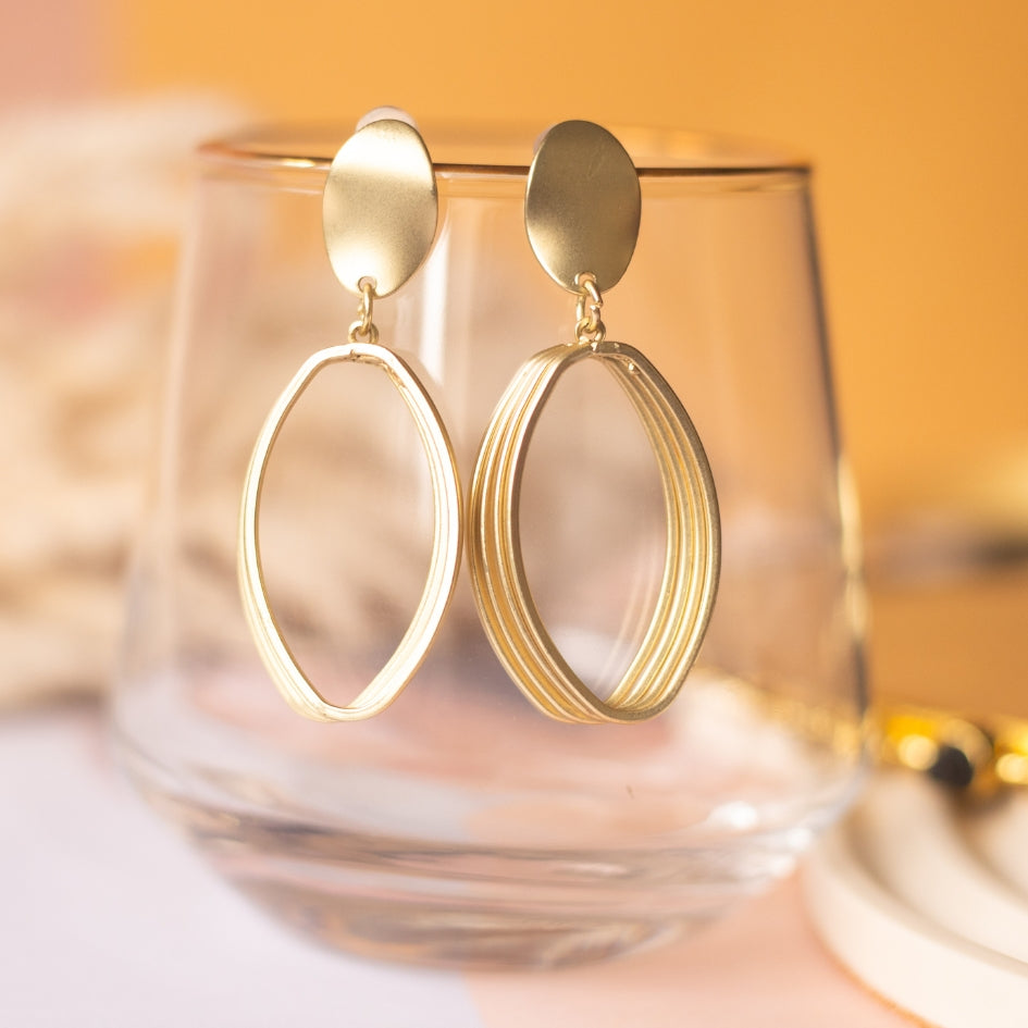 Gold oval  hanging earring