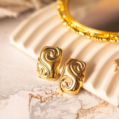 Golden swirl earring