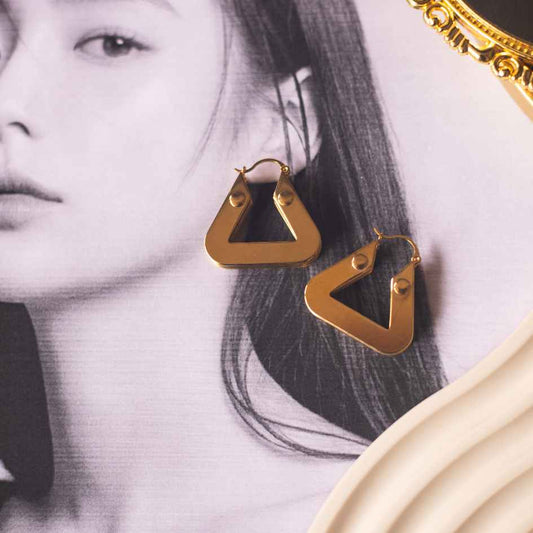 Big triangular statement earrings